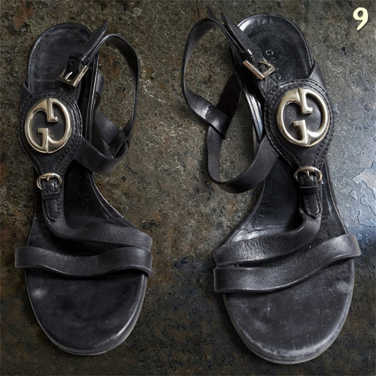Gucci by Tom Ford black leather GG strappy heels, front view