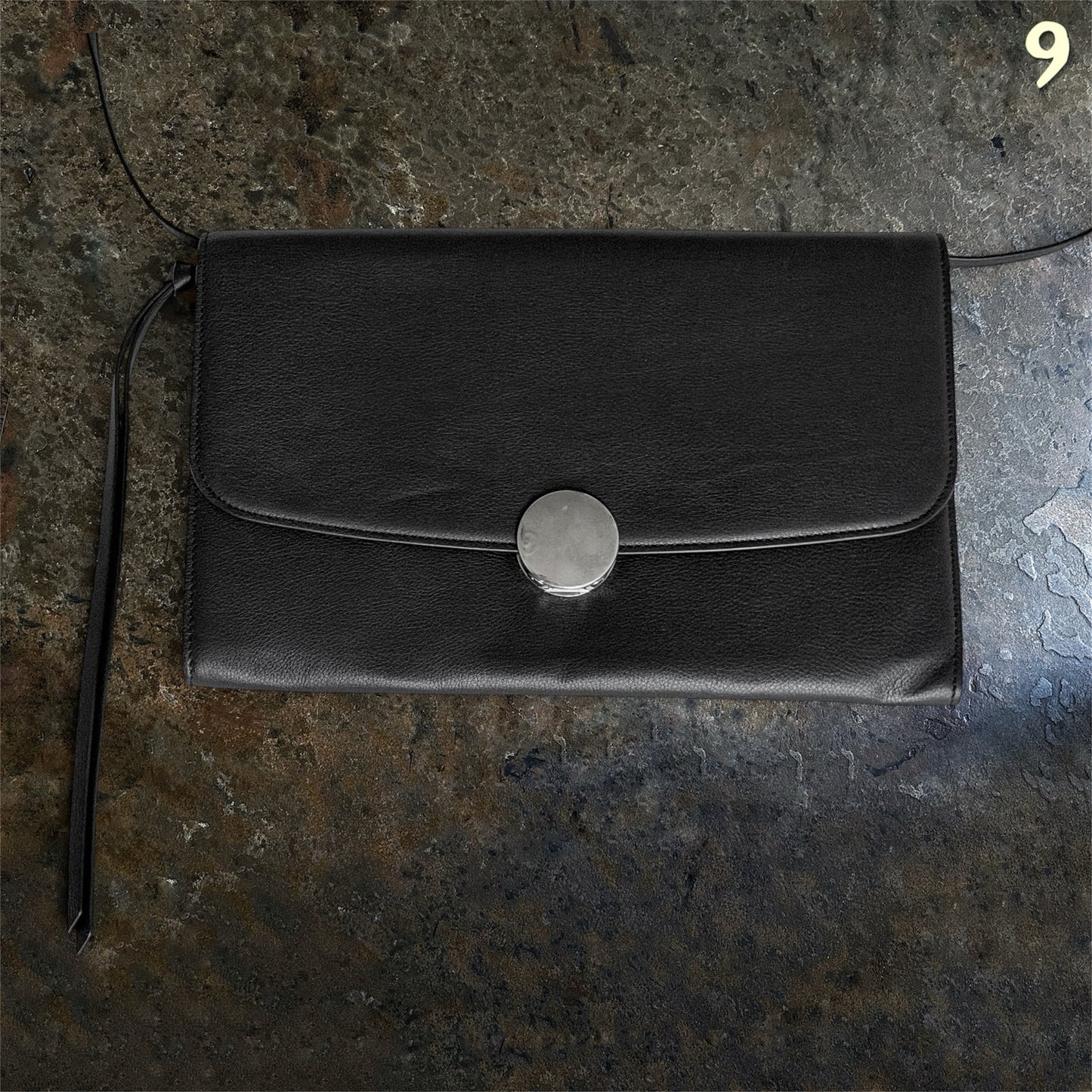 Ann Demeulemeester black leather shoulder bag clean front view