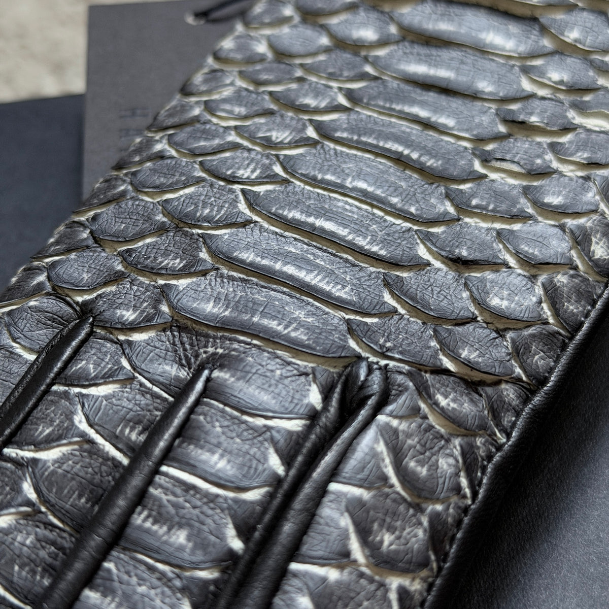 Haider Ackermann Python leather gloves extreme close-up python scale texture