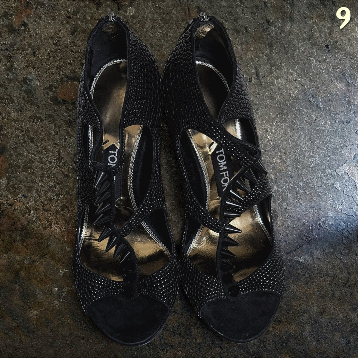 Tom Ford black spiked high heels top view with gold insoles