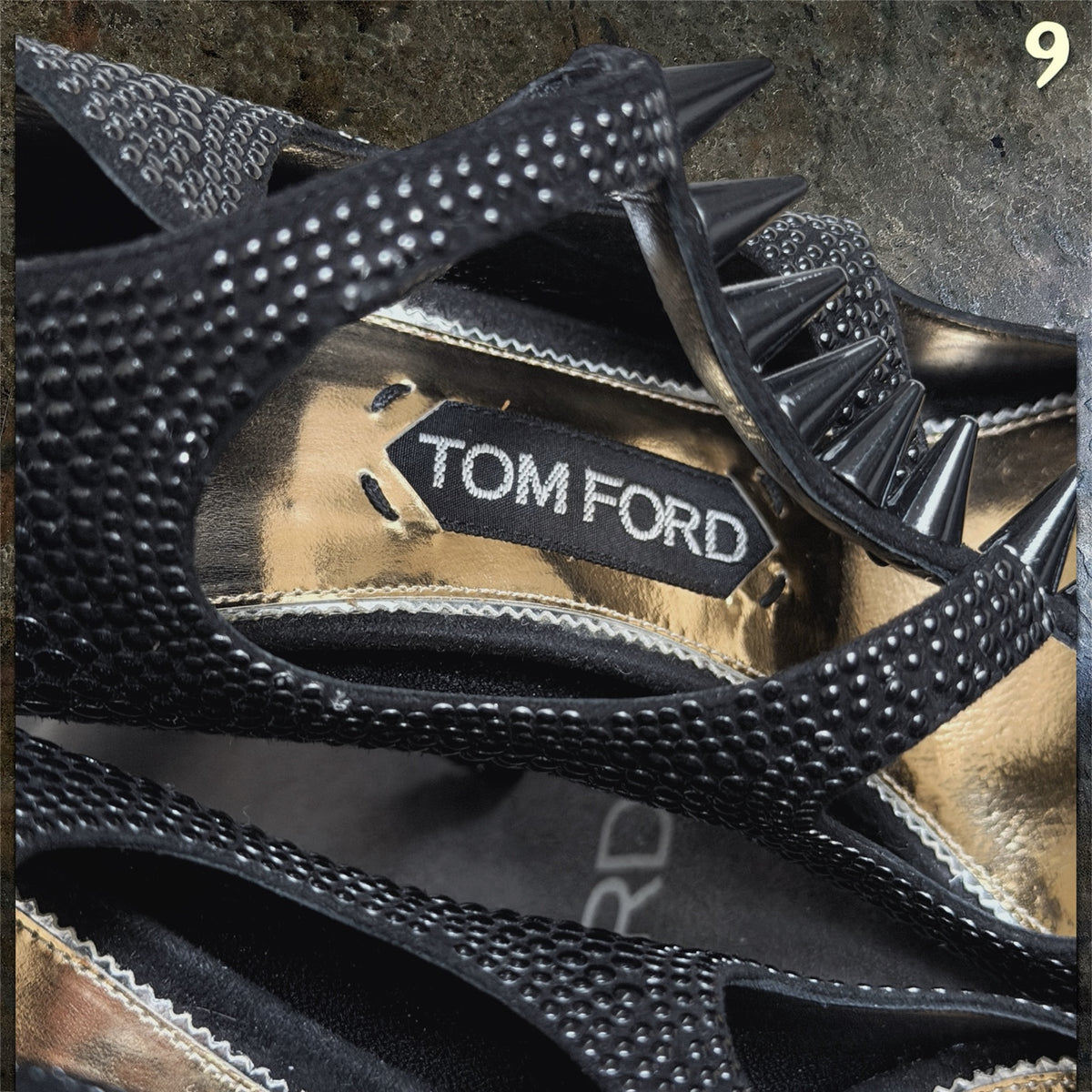 Tom Ford branding and black spike detail inside high heels