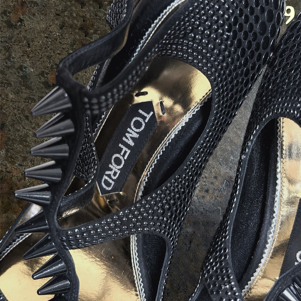 Tom Ford branding and gold insole detail on studded high heels
